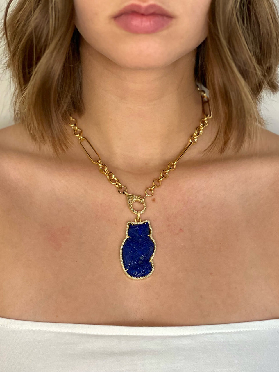 Carved Lapis Owl Set in Pave Diamonds in 22kt Gold over Brass